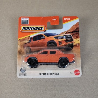 2026 Matchbox MBX Toyota Hilux Pickup #7 Orange Short Card