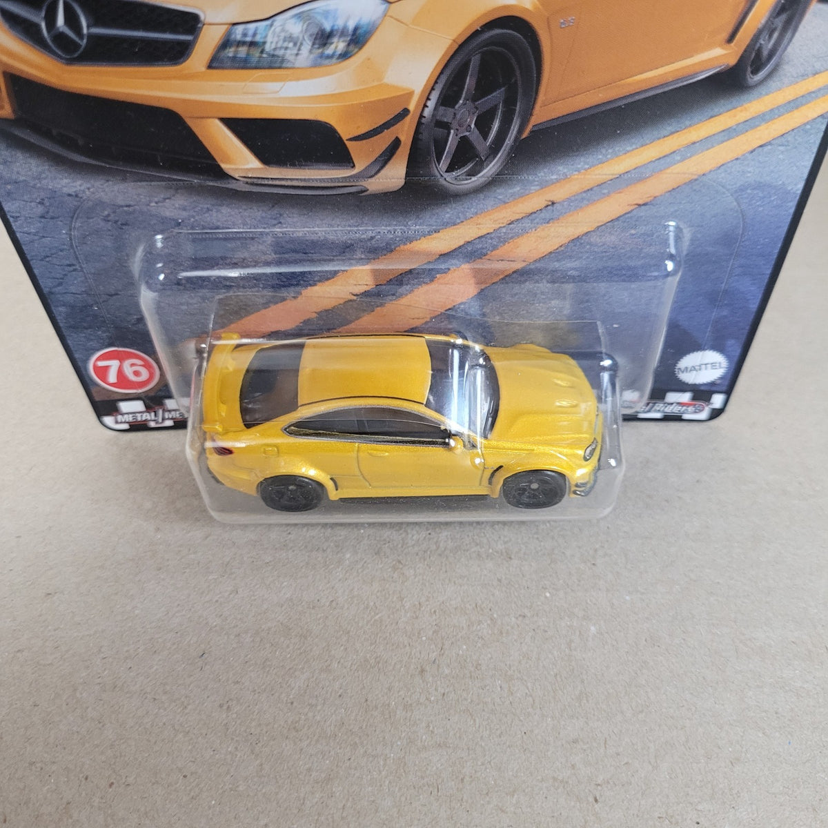 HOT WHEELS PREMIUM BOULEVARD '12 MERCEDES-BENZ C 63 AMG COUPE HKF23 Yellow